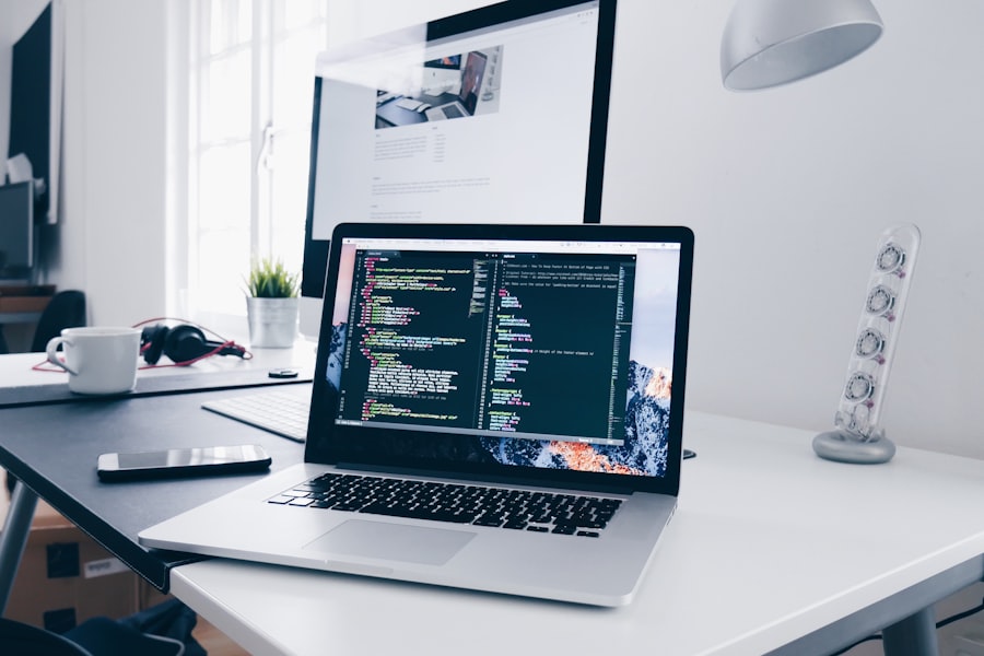 Developer building a website on a laptop